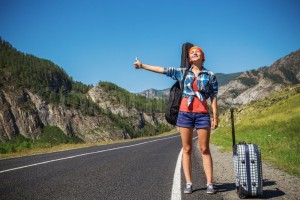 11027685-girl-hitchhiking